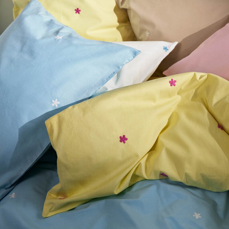 Juna Daisy sengetøy baby 70x100 cm lys blå