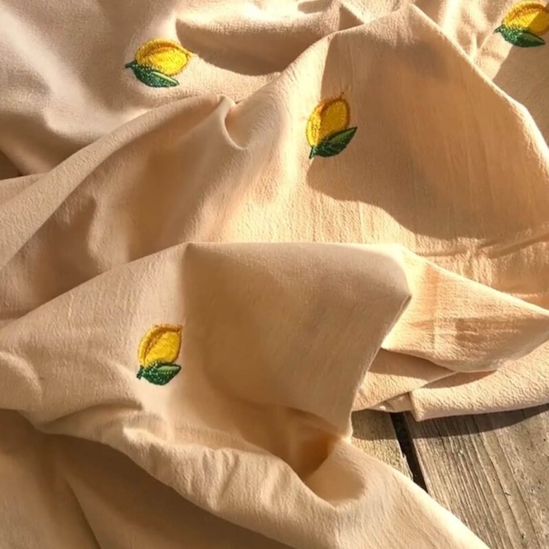 Midnatt Lemon bordduk 250x145 cm beige/gul