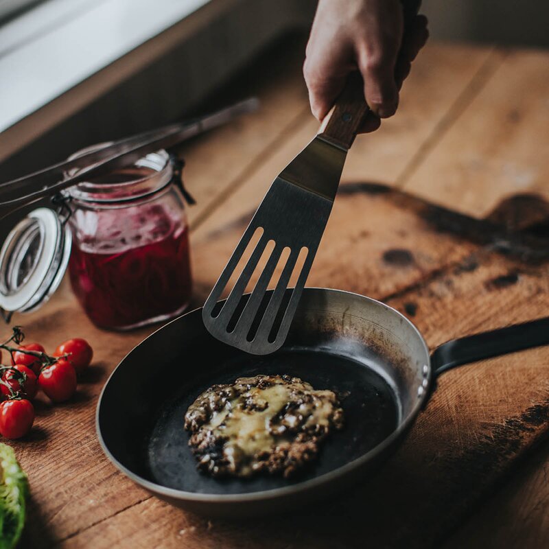 Dorre Steph stekespade slisset 28 cm stål/gummitre