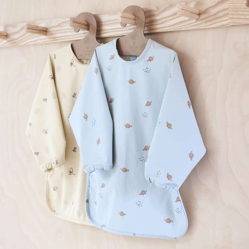 OYOY Dino Cape smekke 45 cm Butter