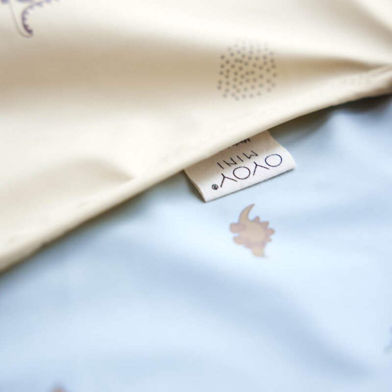 OYOY Dino Cape smekke 45 cm Butter